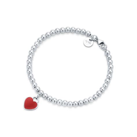 Tiffany red heart tag bead bracelet - Inspired by a key ring we debuted in 1969, the Return to Tiffany collection is famous for its signature motif. This sterling silver bead bracelet features a round brilliant diamond on the iconic heart tag. Make this standout silhouette part of your everyday bracelet stack. Sterling silver with a round brilliant diamond. Size medium. 